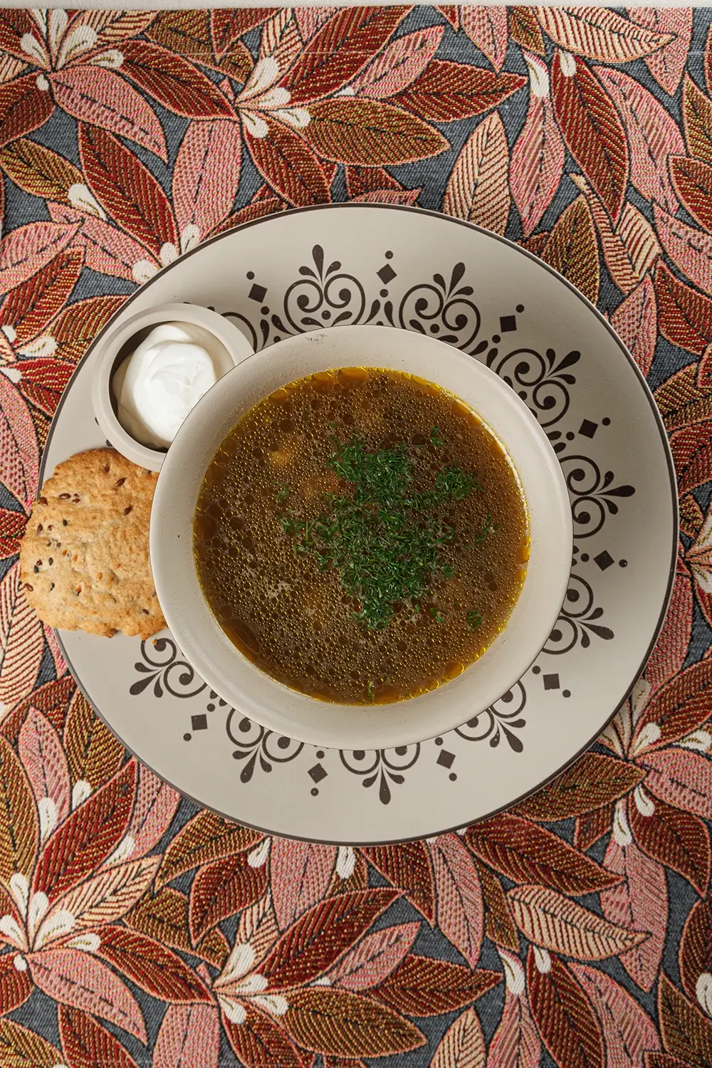 Белорусский суп из перловой крупы «Крупник» на овощном бульоне с белыми грибами и ржаными хлебцами от Ресторана «Кухмистр» Белорусский суп из перловой крупы «Крупник» на овощном бульоне с белыми грибами и ржаными хлебцами от Ресторана «Кухмистр»