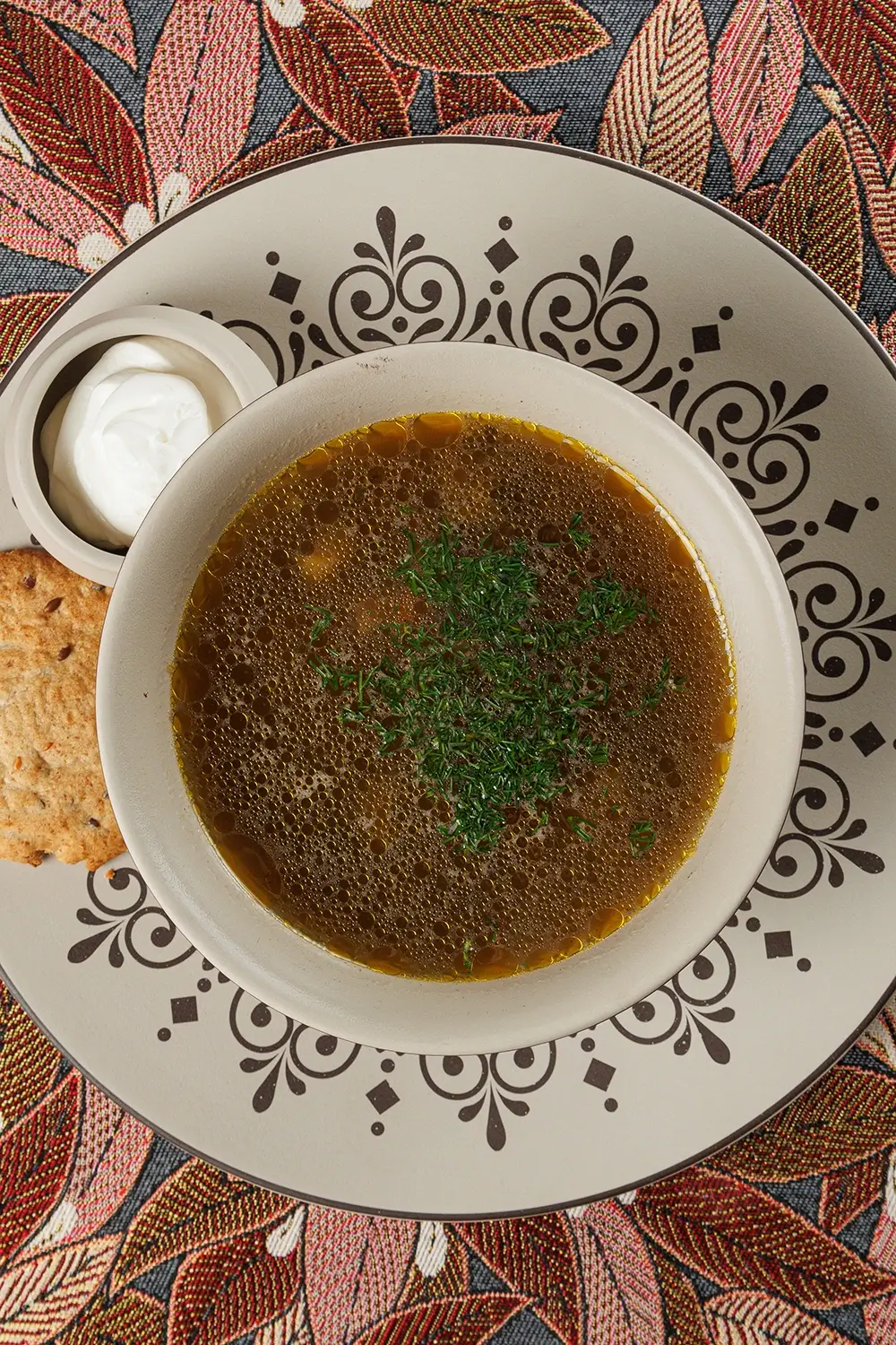 Белорусский суп из перловой крупы «Крупник» на овощном бульоне с белыми грибами и ржаными хлебцами от Ресторана «Кухмистр» Белорусский суп из перловой крупы «Крупник» на овощном бульоне с белыми грибами и ржаными хлебцами от Ресторана «Кухмистр»