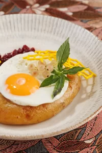 Картофельная колбаса (белорусская «Бульбяная кішка») из тёртого картофеля со шкварками и жареными грибами от Ресторана «Кухмистр»